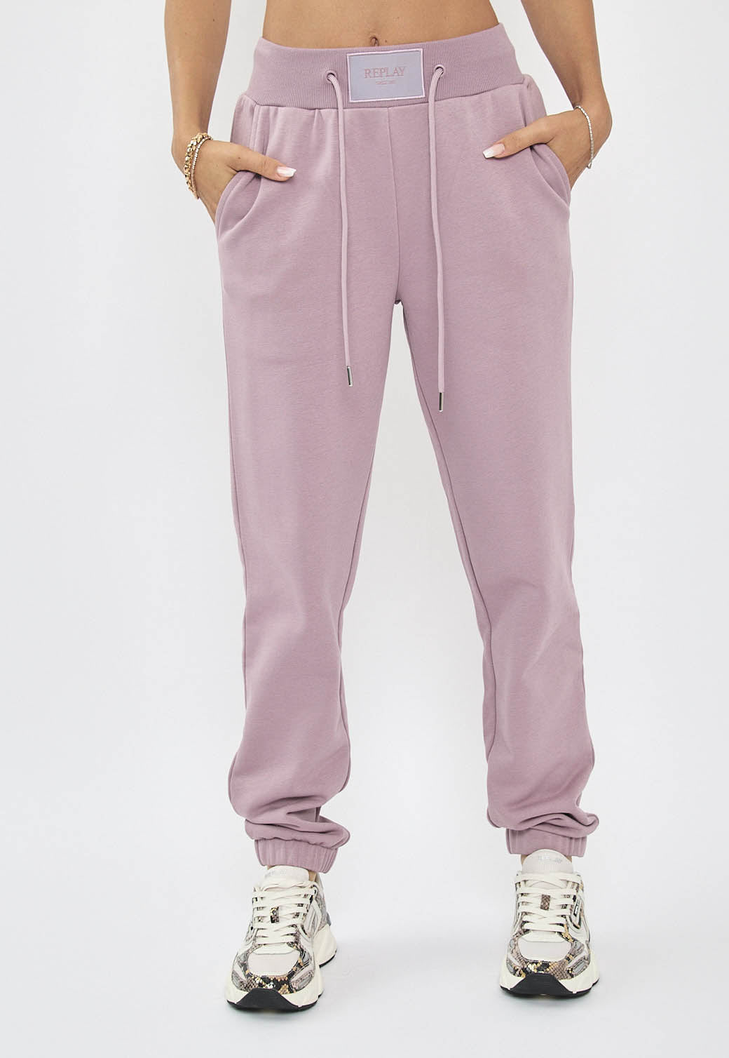 מכנסי טרנינג לנשים בצבע סגול בהיר