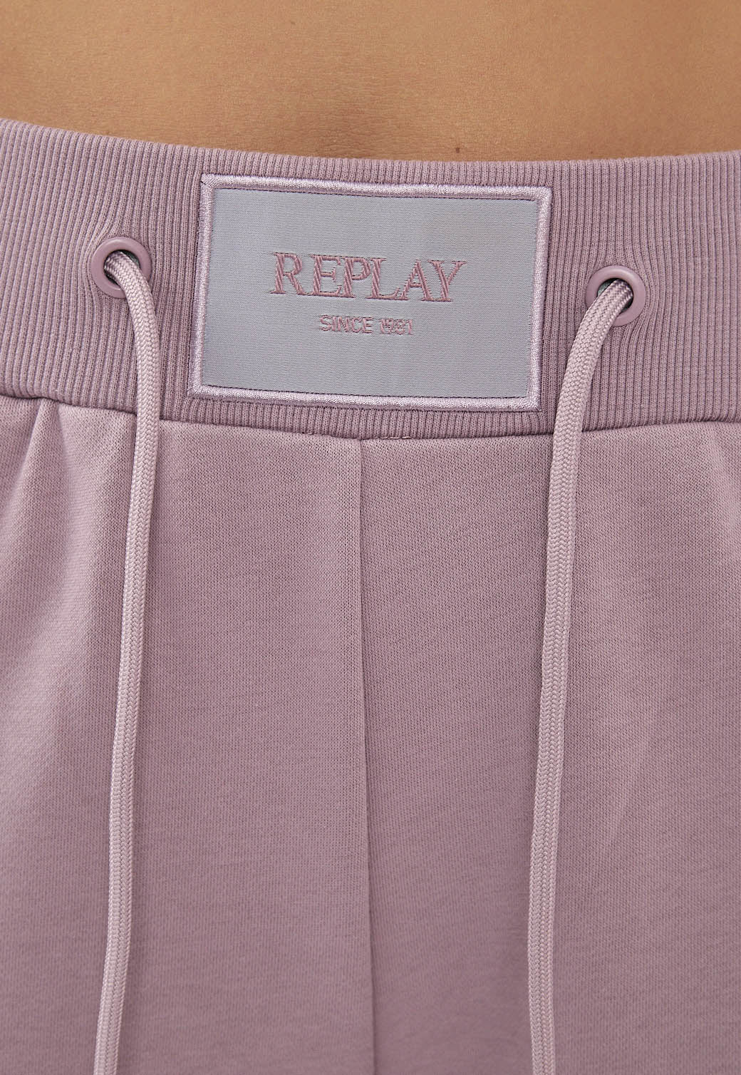 מכנסי טרנינג לנשים בצבע סגול בהיר