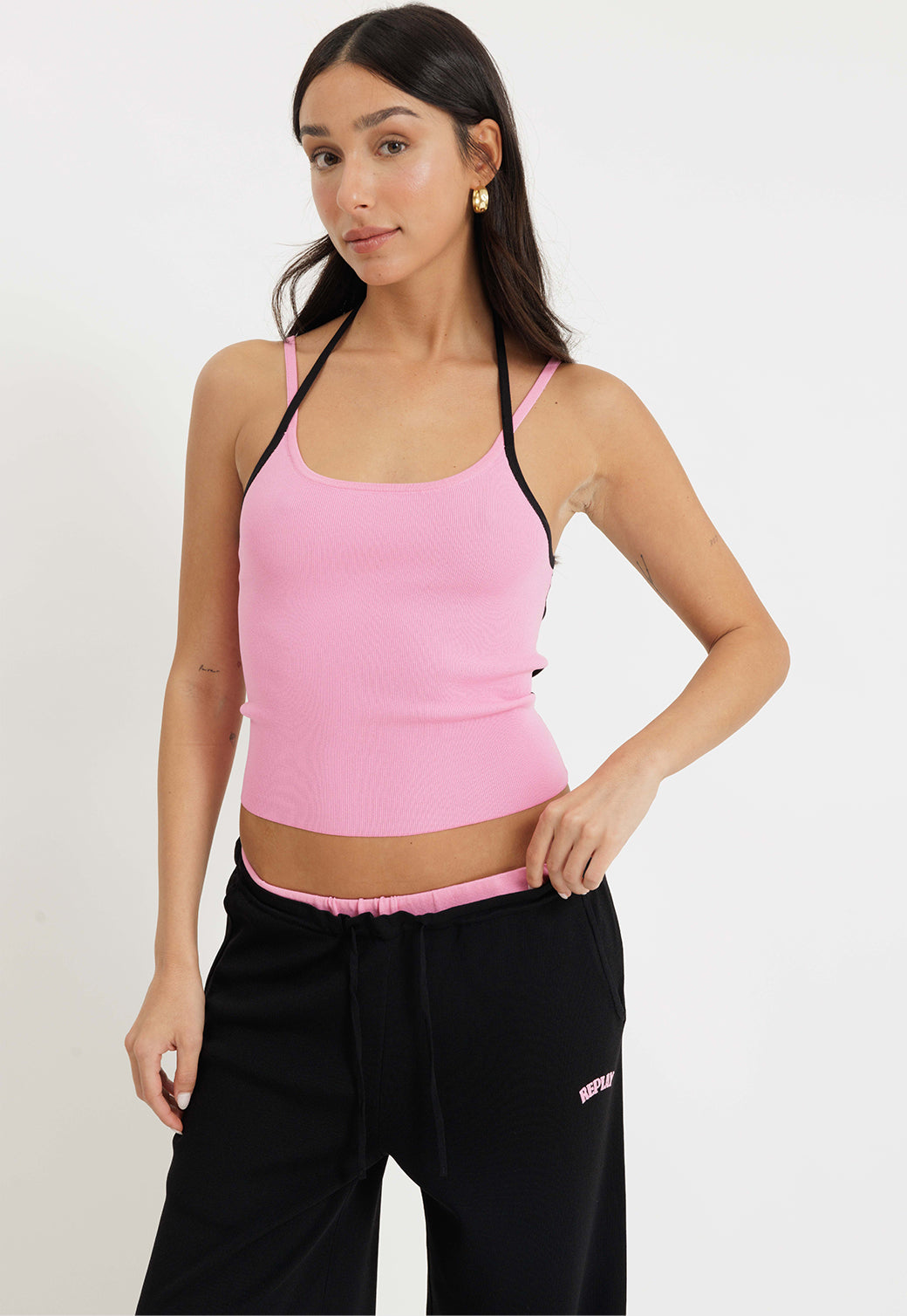 גופייה לנשים בצבע ורוד עם גב שחור