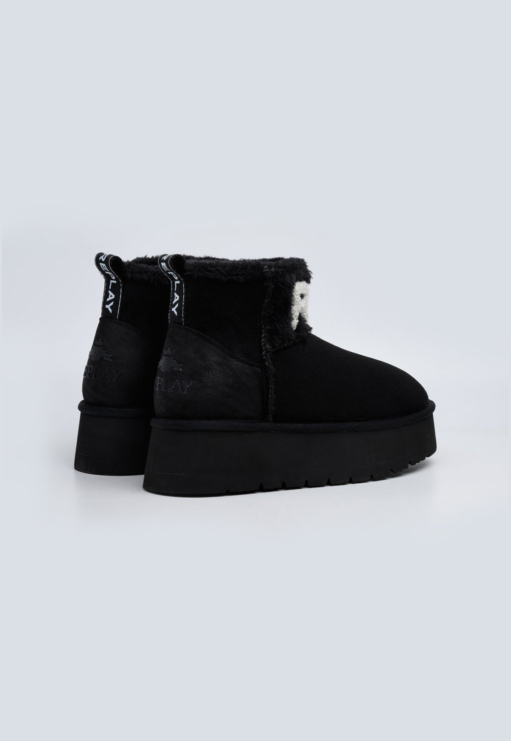 מגפוני פלטפורמה לנשים בצבע שחור עם פרווה