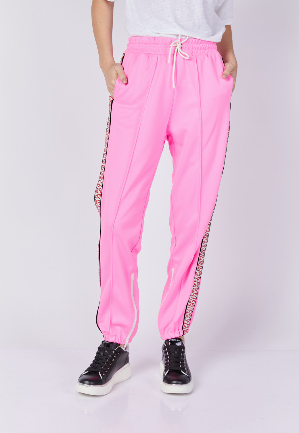 מכנסי טרנינג לנשים בצבע ורוד עם פס צד