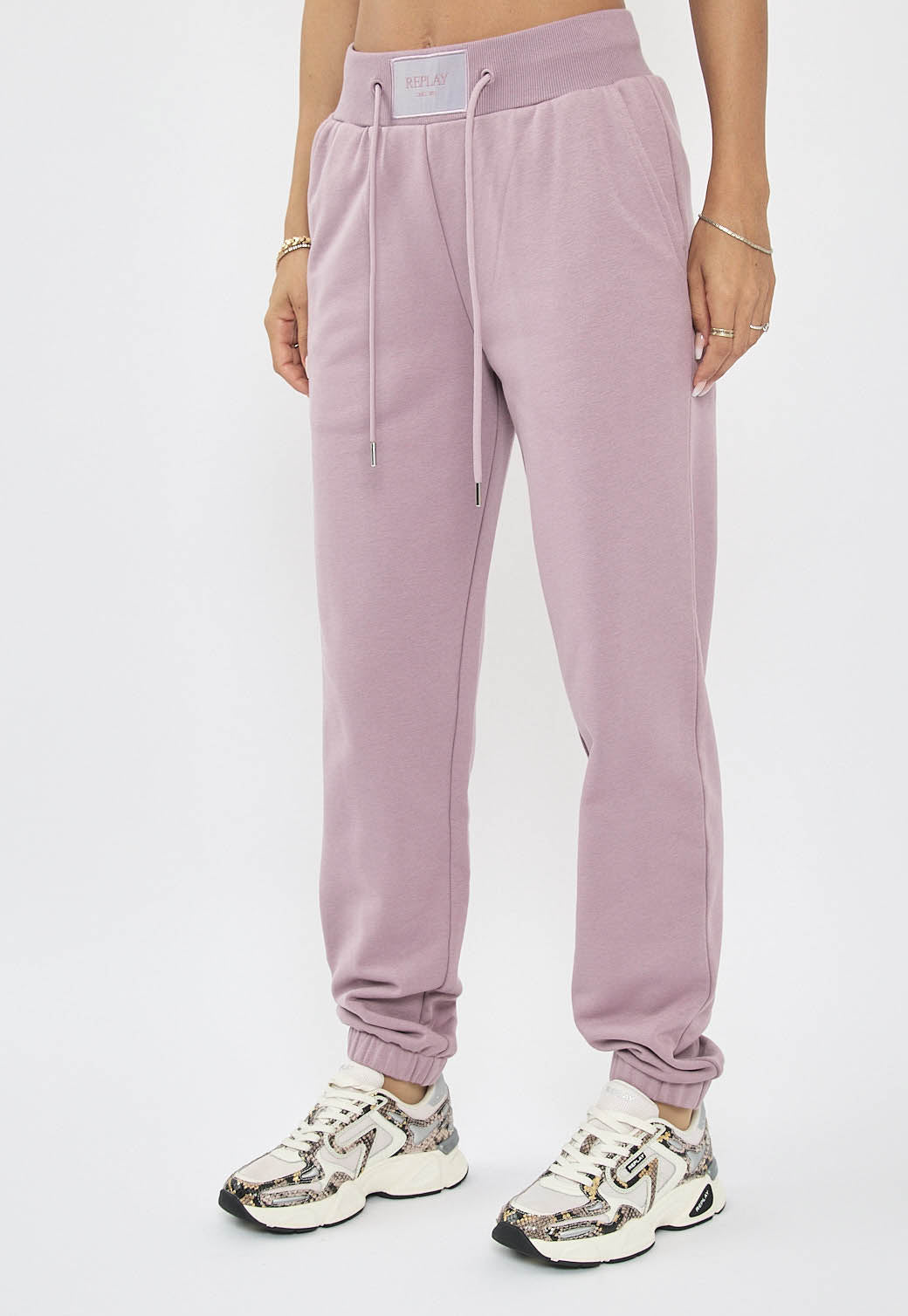 מכנסי טרנינג לנשים בצבע סגול בהיר