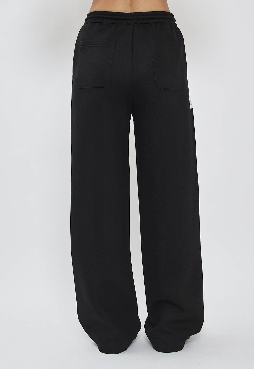 מכנסי טרנינג לנשים INTERLOCK LONG PANTS בצבע שחור