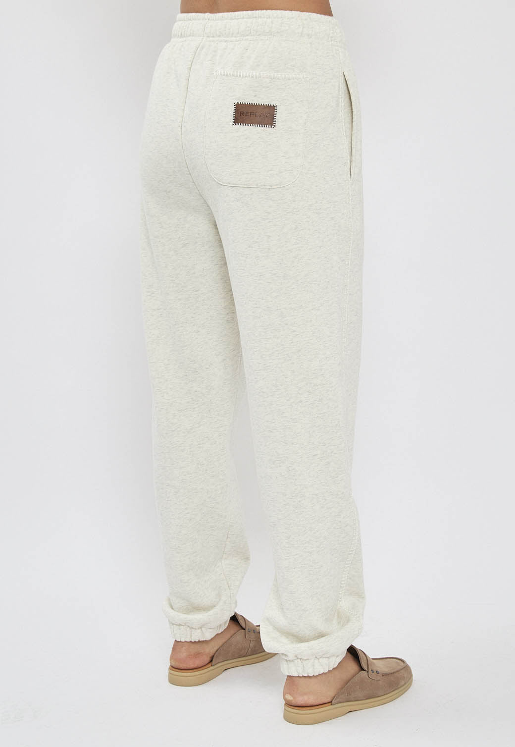 מכנסי טרנינג לנשים בצבע קרם עם שרוך