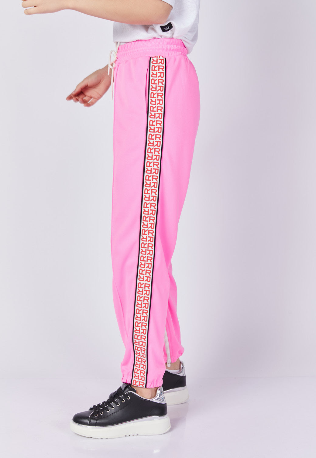 מכנסי טרנינג לנשים בצבע ורוד עם פס צד